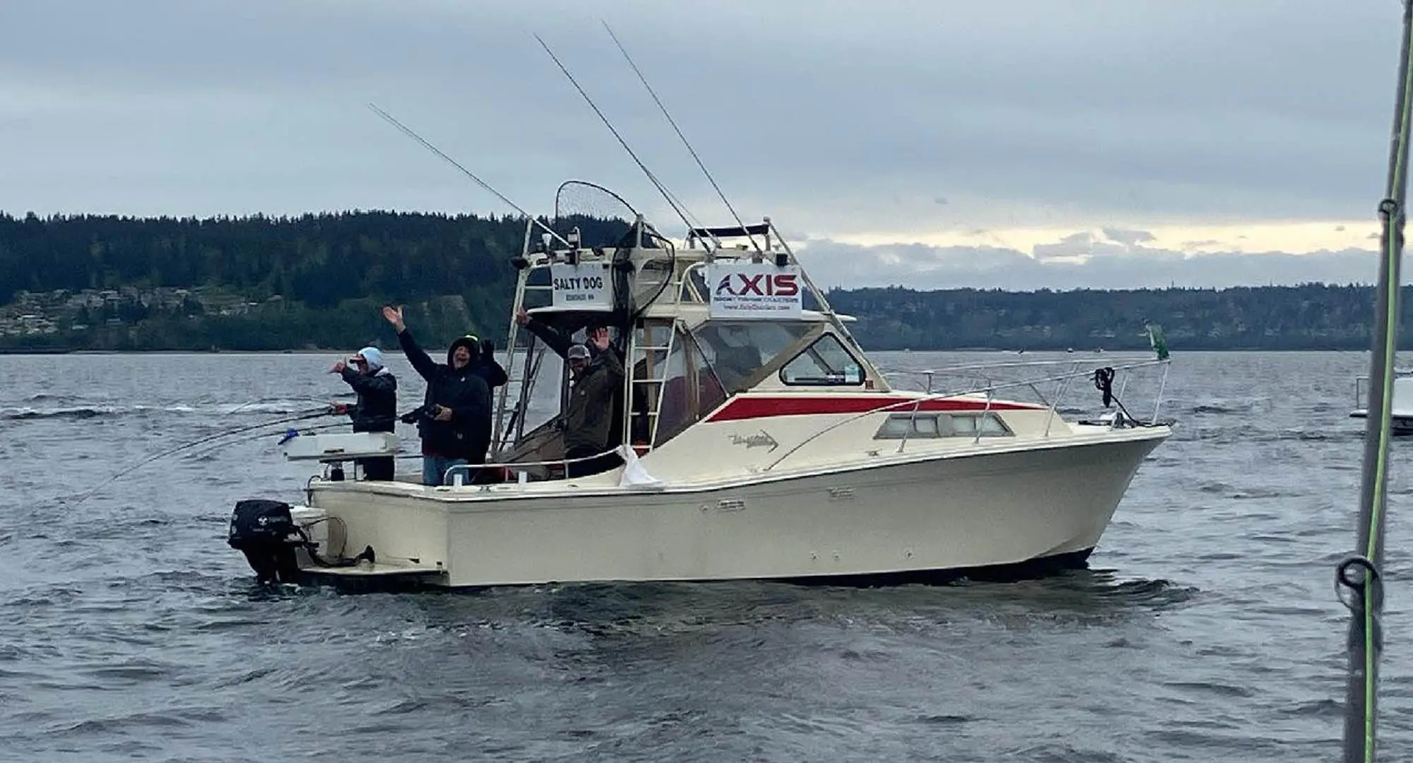 Seattle fishing charter captain guiding guests on Puget Sound